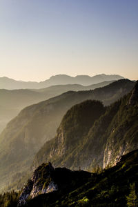 Scenic view of mountain against cloudy sky