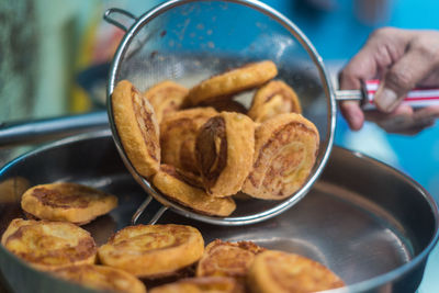 Close-up of person preparing food