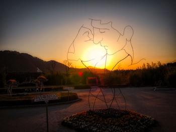 Scenic view of silhouette mountains against sky during sunset