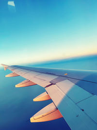 Cropped image of airplane wing