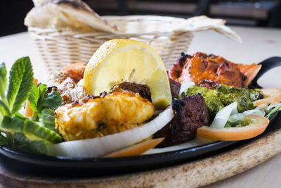 Close-up of fish served in plate on table