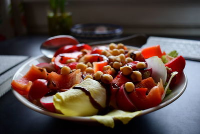 Close-up of fruits in bowl on table