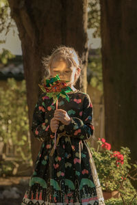 Girl holding pinwheel toy