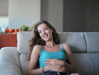 Portrait of beautiful laughing woman at home