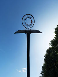 Low angle view of street light against sky