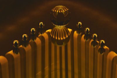 Low angle view of illuminated lighting equipment