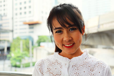 Portrait of a smiling young woman