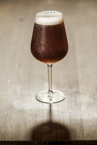 Close-up of wineglass on table