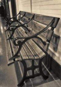 Empty benches in the dark