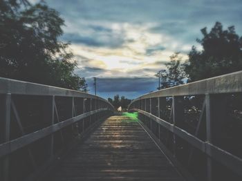 View of footbridge against sky