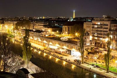 Illuminated cityscape at night