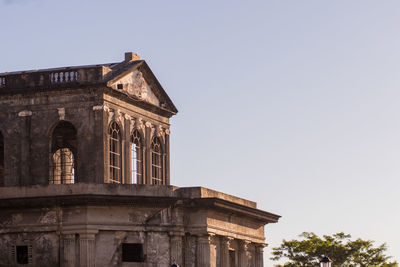 Low angle view of historical building against clear sky