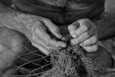 Close-up of man hand with tattoo