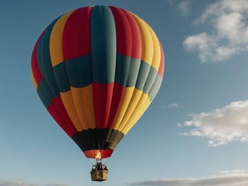 Low angle view of hot air balloons against sky