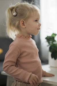 Close-up of young woman looking away