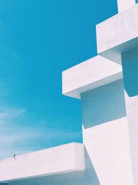 Low angle view of building against blue sky