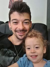Portrait of smiling boy at home