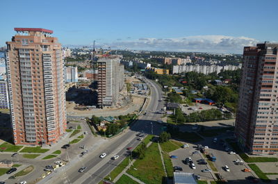 High angle view of street amidst buildings in city