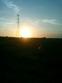 Silhouette landscape against sky during sunset