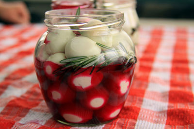 Close-up of drink in glass jar on table