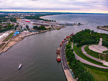 High angle view of river amidst buildings in city