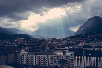 Buildings in town against sky