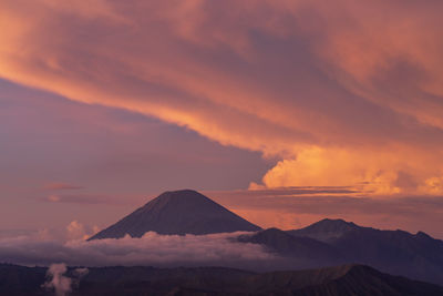 Scenic view of mountains against sky during sunset
