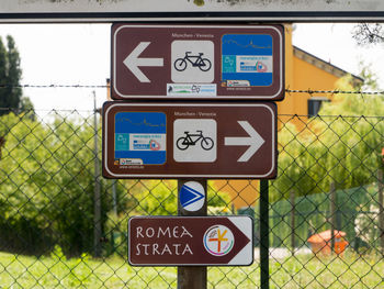 Information sign on chainlink fence