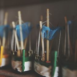 Close-up of boat toys on shelf