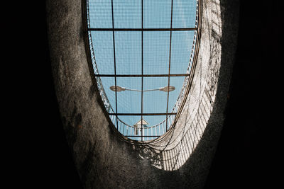 Low angle view of skylight in building