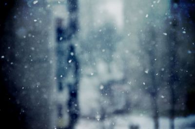 Full frame shot of snowflakes on glass