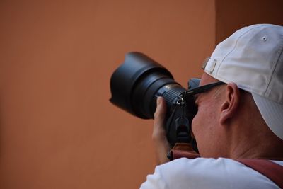 Woman photographing through camera