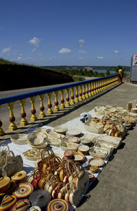 Panoramic view of people on bridge against sky