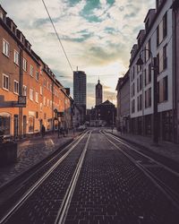 View of street in city against sky