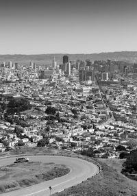 High angle view of buildings against clear sky