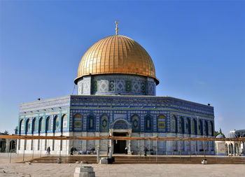 View of the dome of the rock against clear blue sky