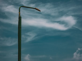 Low angle view of street light against sky