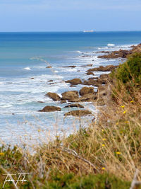 Scenic view of sea against clear sky