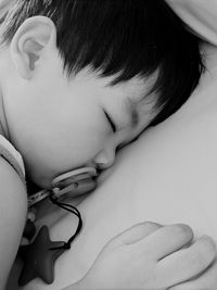 Close-up portrait of cute baby sleeping