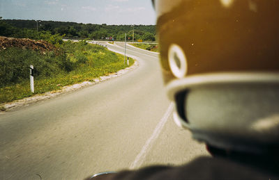 Road seen through car windshield