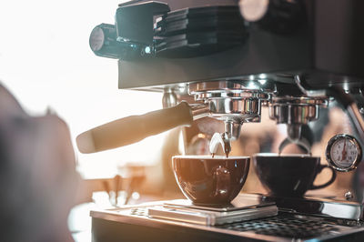 Close-up of coffee cup on table in cafe