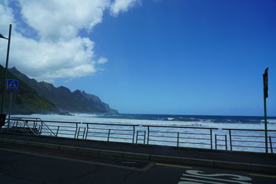 Scenic view of sea against blue sky