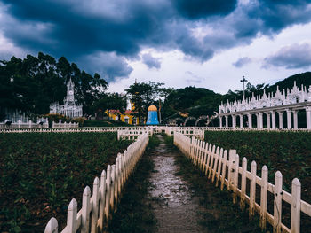 Row of cemetery against sky