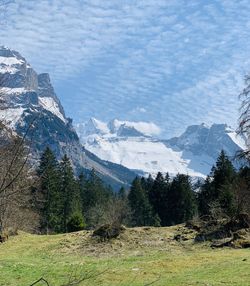 Scenic view of snowcapped mountains against sky