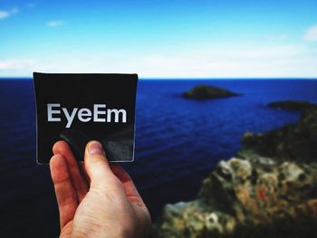 Scenic view of sea against blue sky