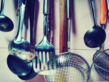 Close-up of clothes hanging in kitchen at home