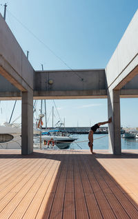 Sportsman practicing stretching and calisthenics