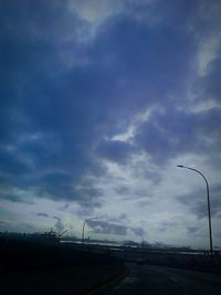 View of road against cloudy sky