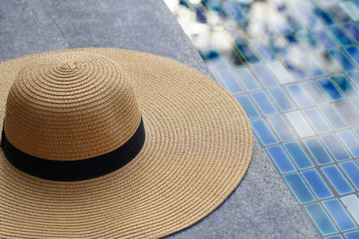 High angle view of hat by swimming pool