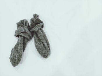 High angle view of shoes on floor against white background